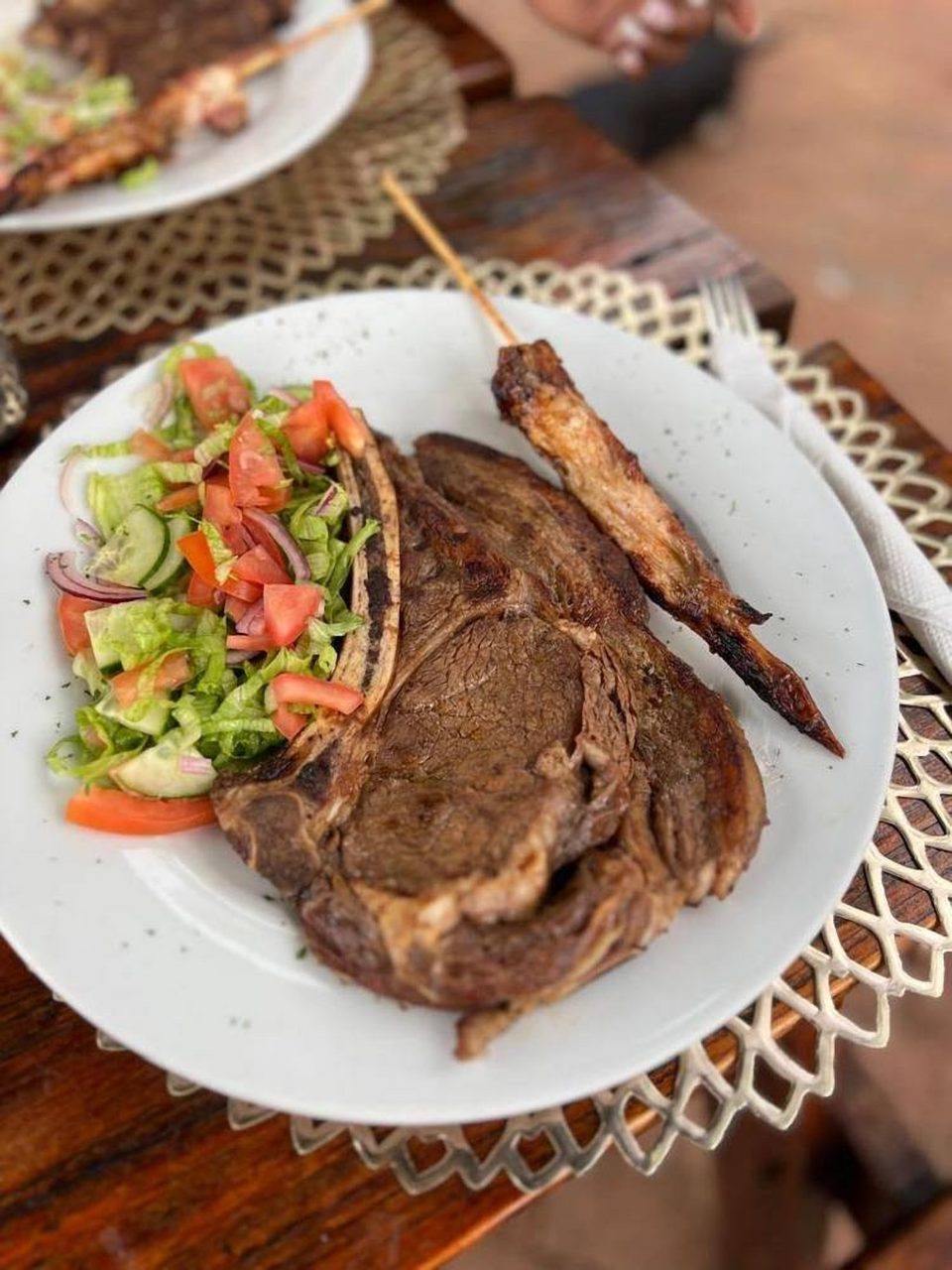 T-bone steak and salad