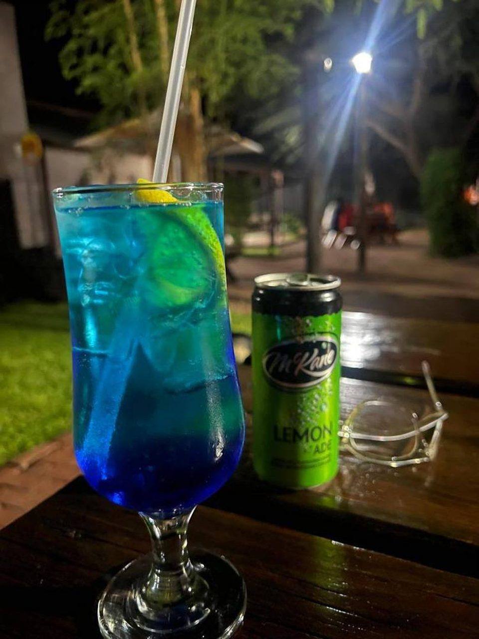 A blue cocktail at the bar