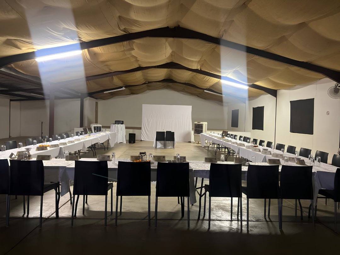 The conference hall set with long tables