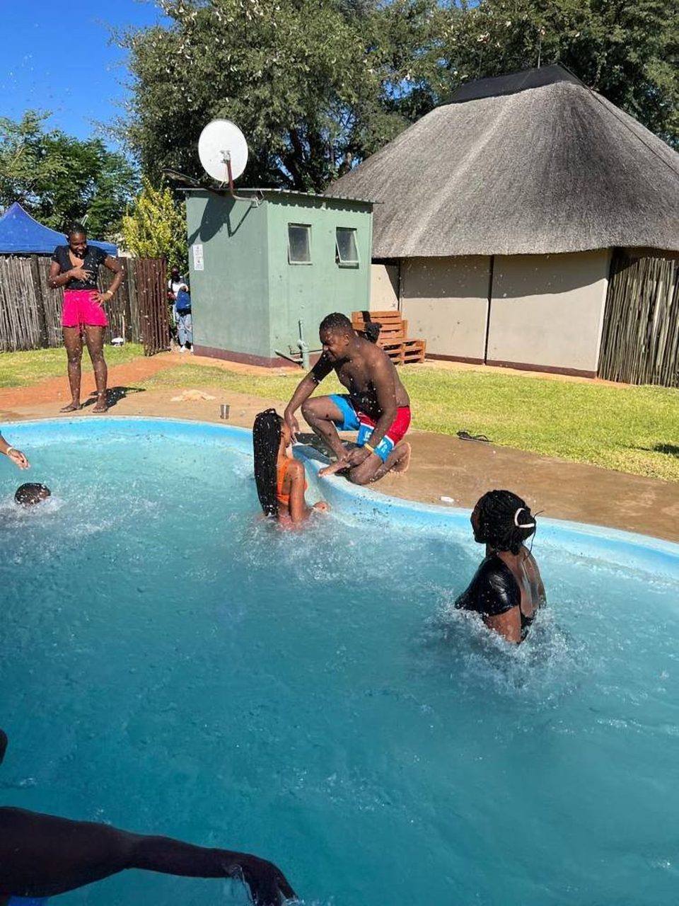 Guests cooling off at the pool